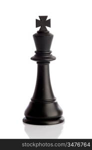 Piece of chess. The king standing on a white background with a reflection on the floor
