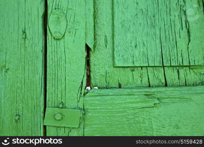piece of colorated green wood as a window in lanzarote spain