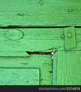 piece of colorated green wood as a window in lanzarote spain