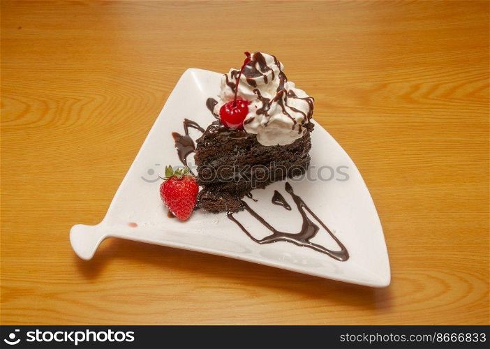 Piece of decadently delicious traditional chocolate cake.. Chocolate Cake