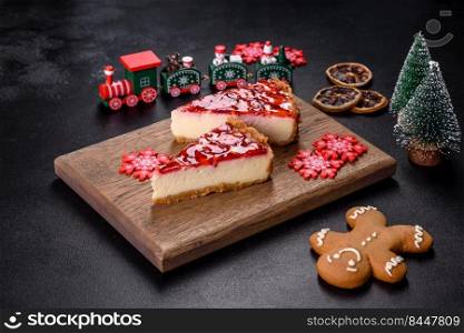 Piece of delicious homemade fresh strawberry pie on a holiday christmas table. Delicious christmas strawberry tart on concrete background, top view, copy space