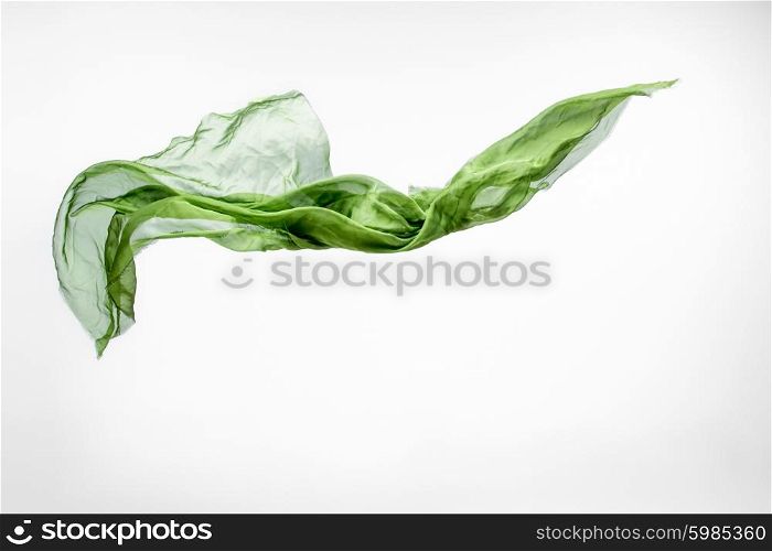 piece of green fabric flying, high speed studio shot, design element