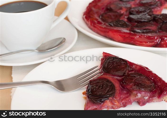 Piece of Homemade Pie With Plums and Coffee