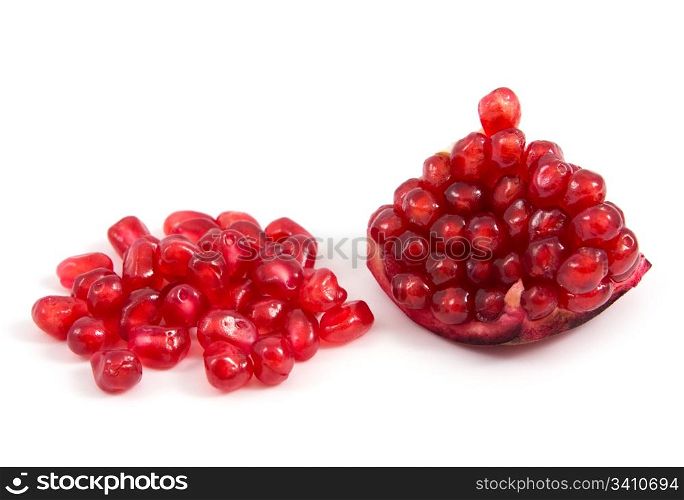 piece of pomegranate over white background
