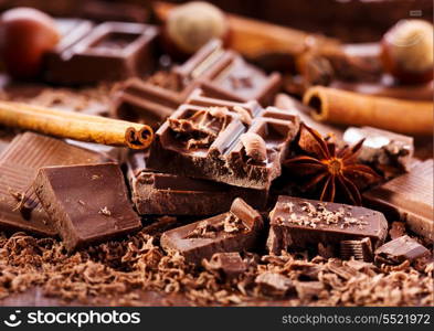 pieces of chocolate on wooden table