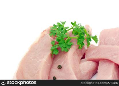 Pieces of crude meat with parsley