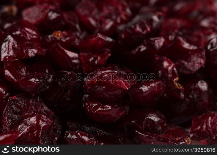 Pieces of dried cranberries close up for background
