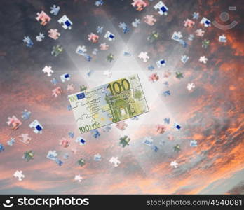 pieces of euro banknote puzzle getting together