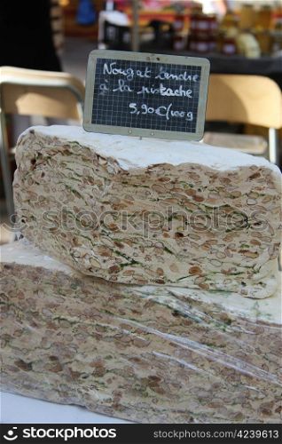 pieces of fresh made nougat at a market in the Provence, France