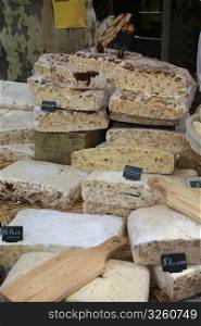 Pieces of fresh nougat on a french market. Nougat is a local product of Southern France