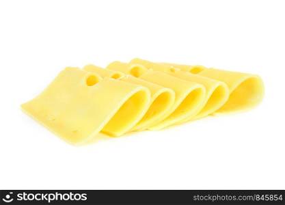 Pieces of fresh yellow cheese isolated on a white background in close-up