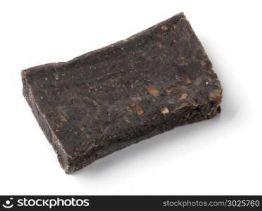 Pieces of Moroccan hashish laid on the white background
