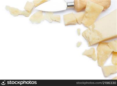 pieces of Parmesan cheese and knife isolated on white background. pieces of Parmesan cheese and knife on white background