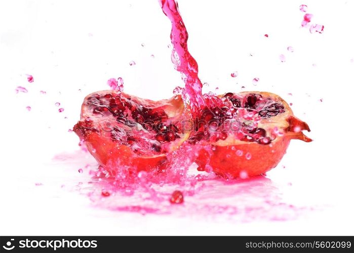 pieces of red ripe pomegranate in juice