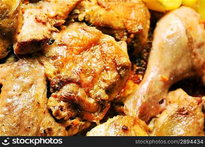 Pieces of tasty roast chicken close up