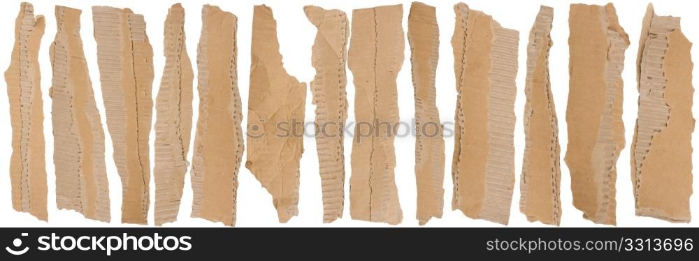 Pieces of torn brown corrugated cardboard, Isolated on White Background