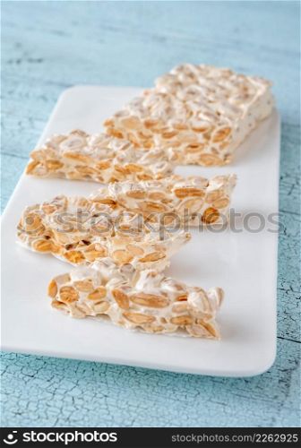Pieces of turron European nougat confection with almond
