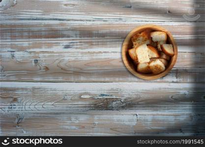 Pieces roasted bread in Creative conceptual top view flat lay composition with copy space isolated.