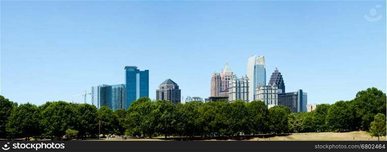 Piedmont Park in Atlanta, GA with Skyline in the back on a sunny summer day.