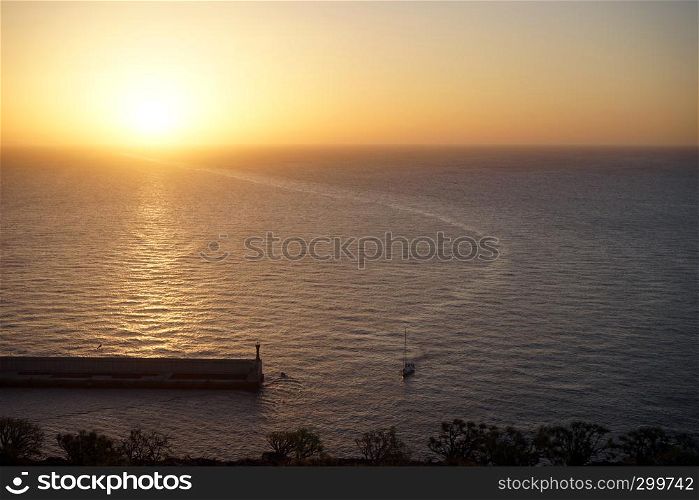 Pier and sunset on the La Gomera island of Canary islands, Spain