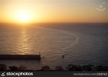 Pier and sunset on the La Gomera island of Canary islands, Spain