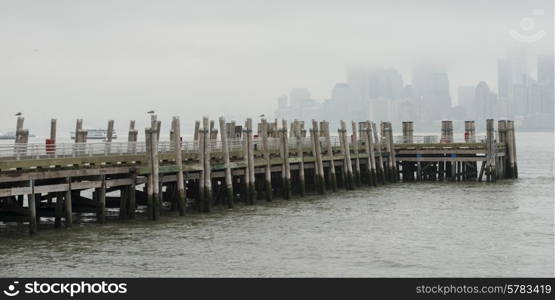 Pier at Upper New York Bay, Liberty Island, New York Harbor, Manhattan, New York City, New York State, USA