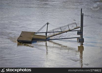 pier cut off from the shore because of a flood