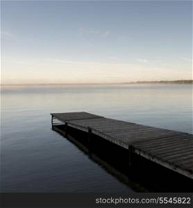 Pier in a lake, Riding Mountain National Park, Manitoba, Canada