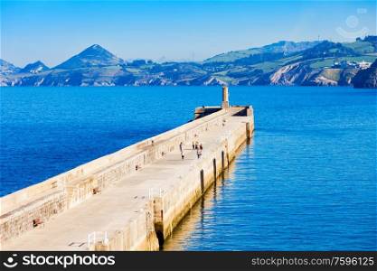 Pier of Castro Urdiales. Castro Urdiales is a small city in Cantabria region in northern Spain.