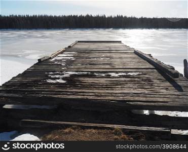 pier on the river in winter