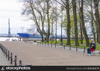 Pier with the beacon in Kronstadt Russia