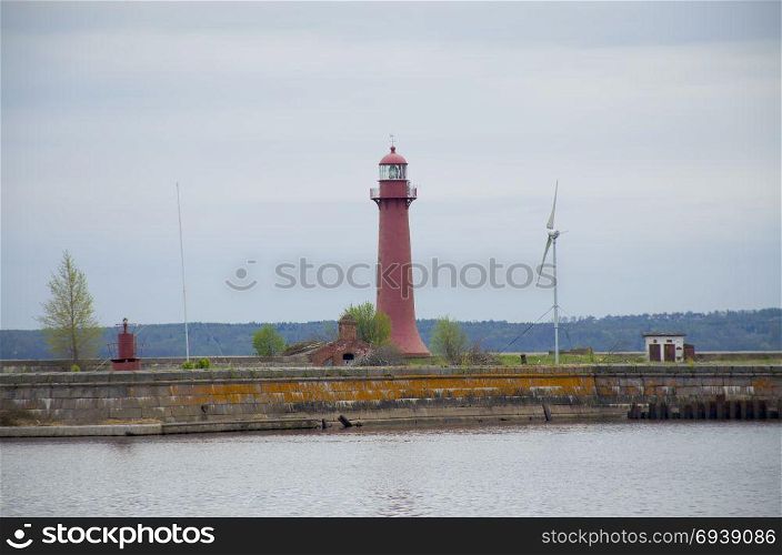 Pier with the beacon in Kronstadt Russia