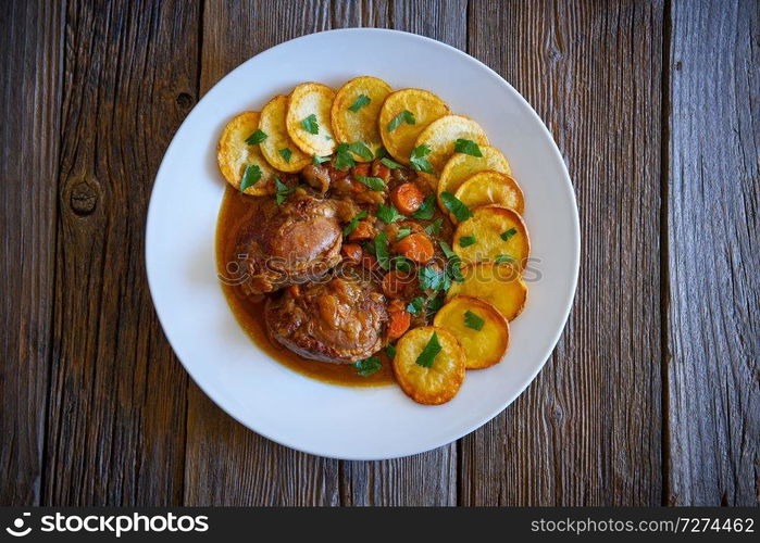 pig cheek recipe on wooden table board