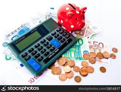piggy bank and calculator. Piggy bank with calculator and money