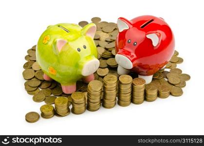 Piggy bank and coins isolated on white