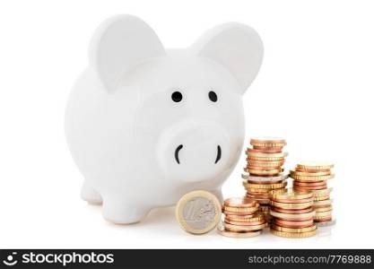 Piggy bank and coins stack on white background