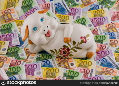 piggy bank and euro banknotes money. image for saving.