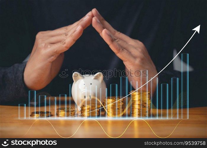 Piggy bank investment - businessman hand placing coins in a piggy bank with a graph of investment returns in the background. Concept for financial security and savings.