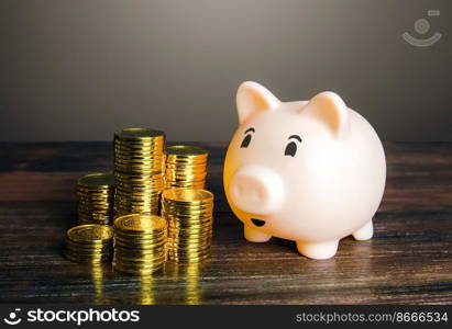 Piggy bank is happy to see stacks of coins. Looking for money. Earnings and savings. Loan on favorable terms. wealth and economic prosperity. Will succeed. Get profit. Get a good paid. Bank deposit