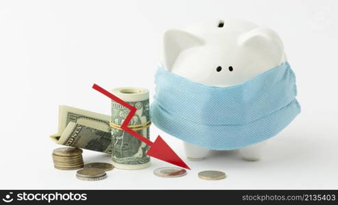 piggy bank wearing medical mask bankruptcy concept