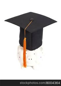 Piggy bank with black graduation hat isolated on white background