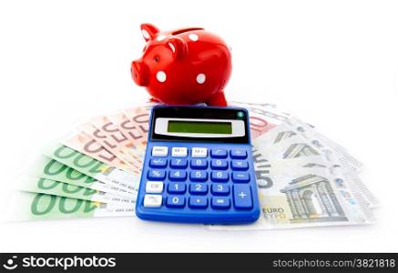Piggy bank with euro money and calculator