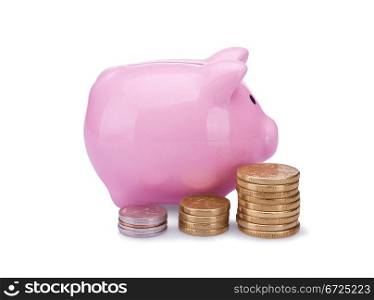 piggy bank with golden and silver coins isolated on white background