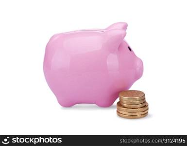 piggy bank with golden coins isolated on white background