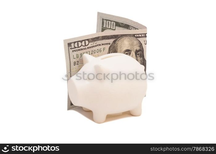 Piggy bank with hundred dollar bill isolated on white background