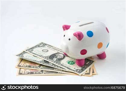 piggy bank with money on white background