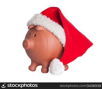 Piggy bank with Santa Claus hat isolated on white