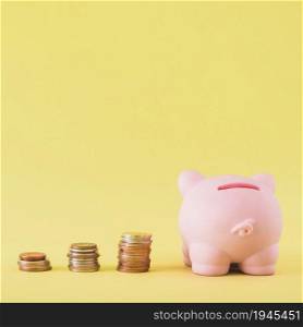 piggy bank with stacks coins. High resolution photo. piggy bank with stacks coins. High quality photo