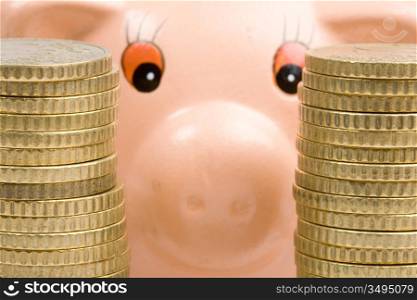Piggy bank with two towers of coins-Shallow DOF-