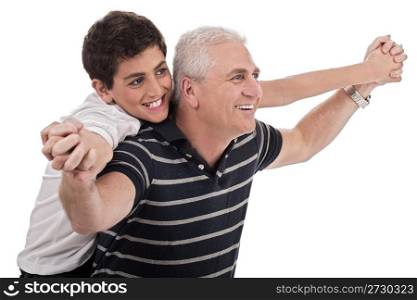 Piggyback ride given by grandfather on isolated background